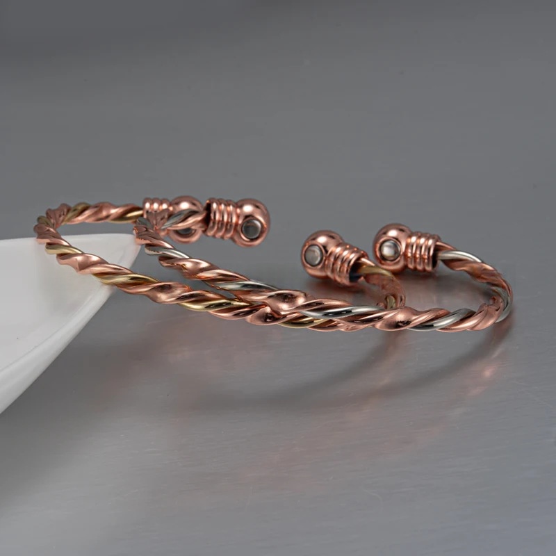 Magnetic Therapy Bracelet With A Red Copper-colored Twisted Rope Design